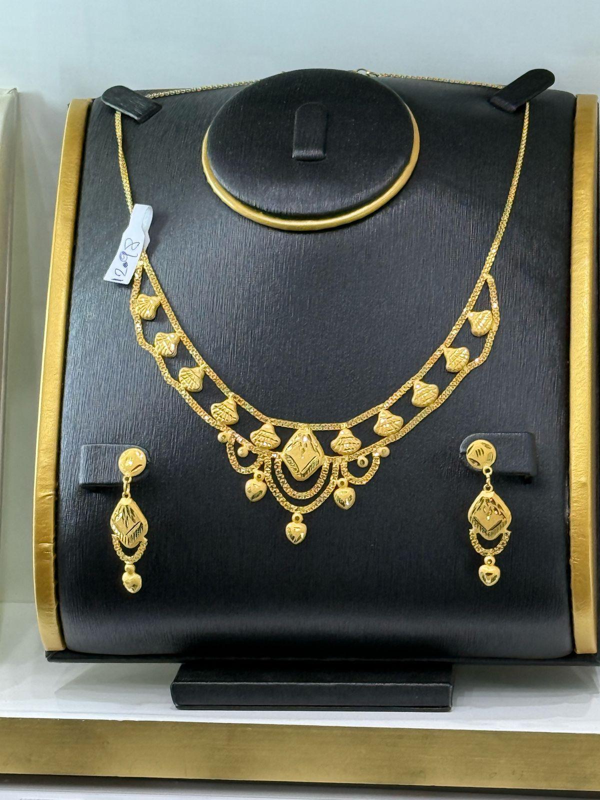 Heritage Drop Set — Layered chain with leaf motifs and drop earrings